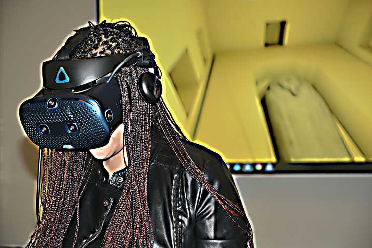 essica Johnson, a Ph.D. student in Egyptology, dons a Vive Cosmos VR headset to tour the virtual 2,500-year-old tomb of Psamtik, a physician and military officer. (UC Berkeley photo by Yasmin Anwar)