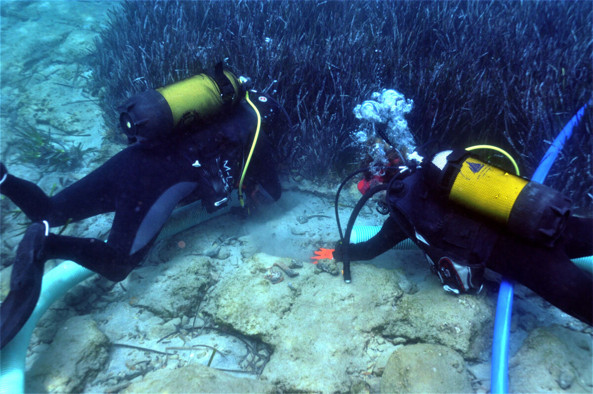Clearing the surface of submerged structure at Poros (photo: MOCAS). 