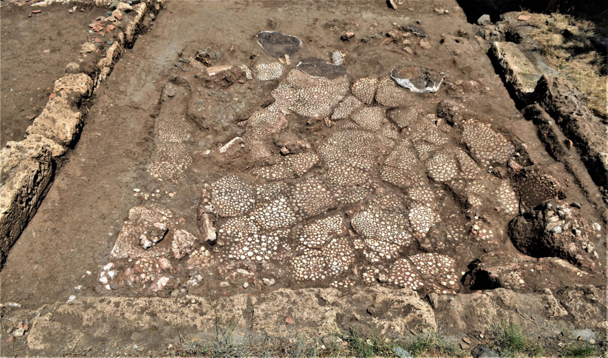 The floor of the large space after its clearing. The cracks and irregularities in soil levels are due to a terrifying landslide in the 1st c. AD which caused the city of Aegae to be abandoned for good. Photo: Hemathia Ephorate of Antiquities  