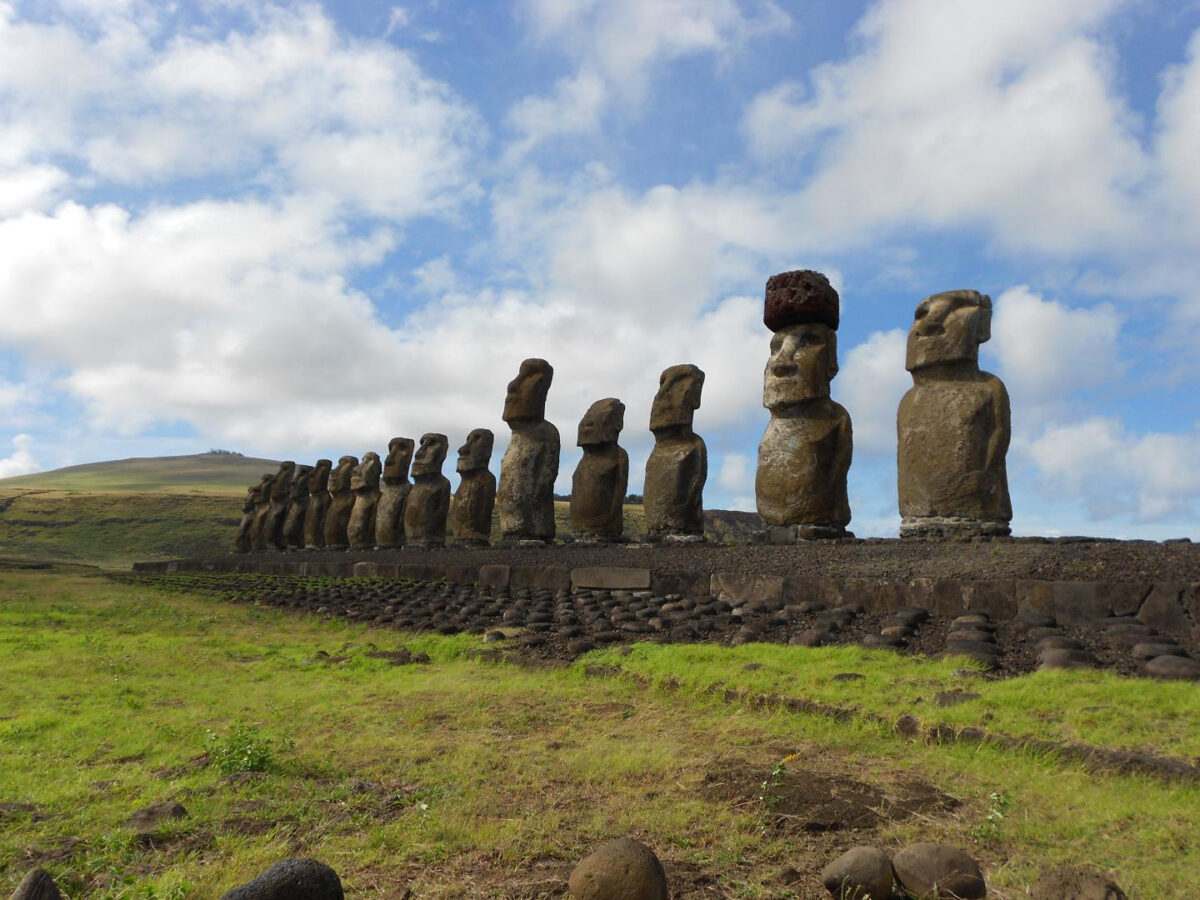 This is a restored statue platform with standing moai on the south coast of Rapa Nui. Image Credit: Sean Hixon.