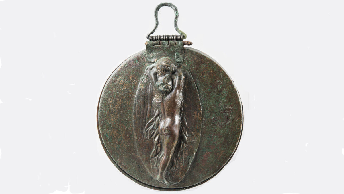 Bronze folding mirror with a relief representation of the abduction of the young Ganymede by Zeus in the guise of an eagle. From Makistos, ‘Petropigada’. Hellenistic period. Archaeological Museum of PyrgosΜ 2441.