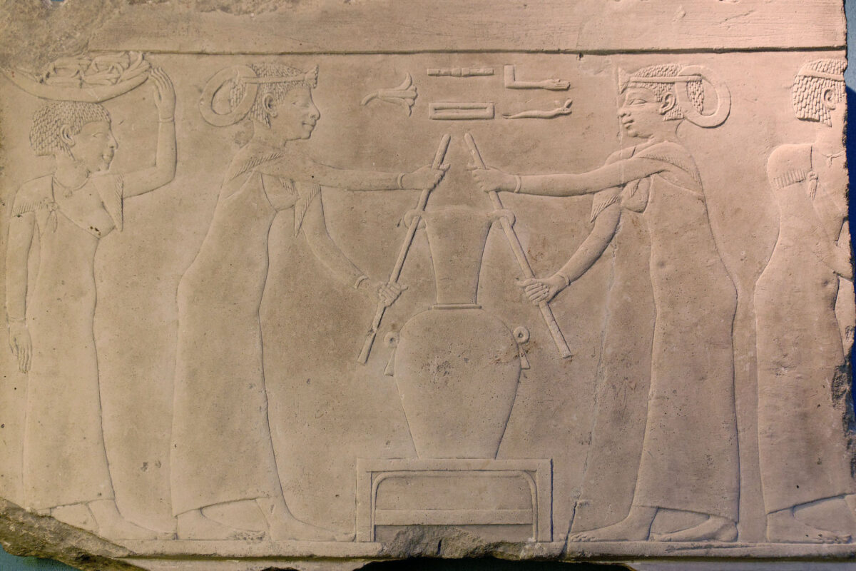 The making of lily perfume. Limestone, fragment from the decoration of a tomb, 4th dynasty of Egypt-(2500s BC). Louvre Museum. 
