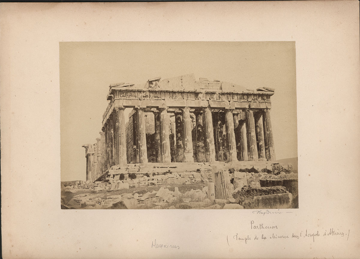 Fig. 38.  View of the Parthenon from the W. The marks of the cannonfire of the sieges of the Acropolis are visible on the west face and the columns of the opisthonaos. Photo by P. Moraitis, 1865, ΕΙΜ Photo Archive.