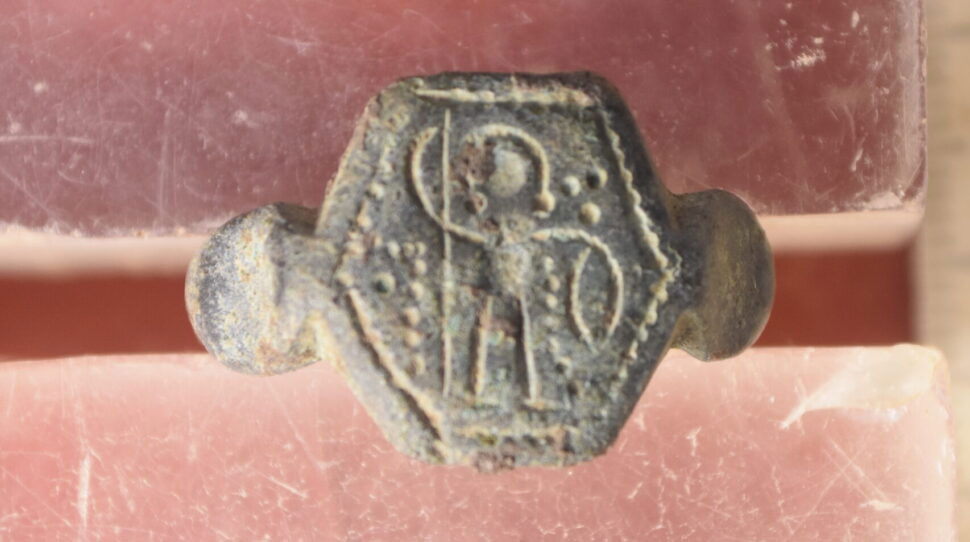 Bronze ring depicting a military saint (?), haloed, holding a spear and a shield. Found inside Grave 8. Image credit: The Open University of Cyprus.