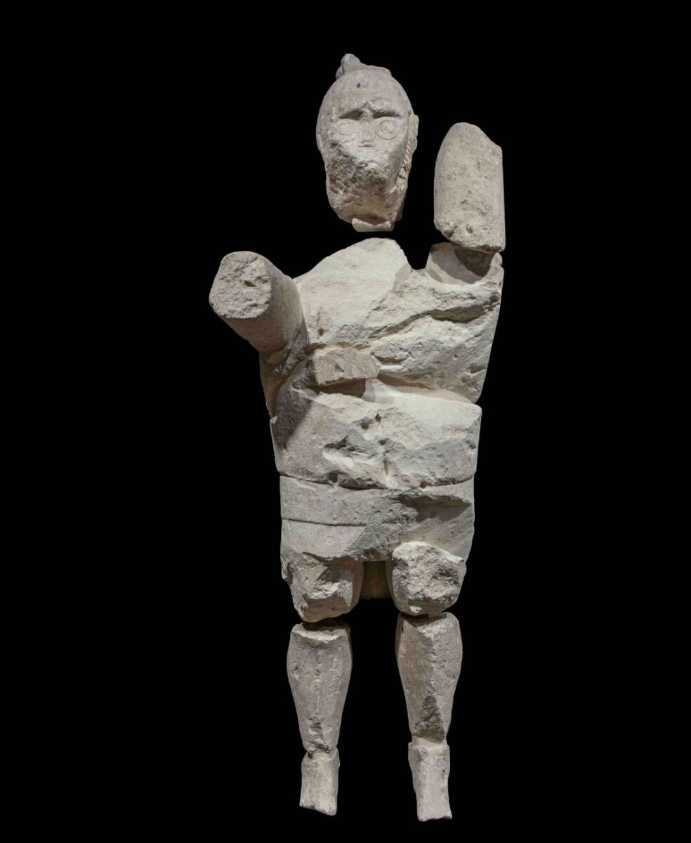 Limestone statue of a boxer, Mont’e Prama necropolis, Early Iron Age. National Archaeological Museum of Cagliari (image source: AMTH).
