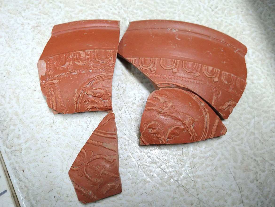 HS2 archaeologists reveal secrets of small Roman town excavated near Aylesbury: Samian pottery uncovered during archaeological excavations at Fleet Marston, near Aylesbury, Buckinghamshire.