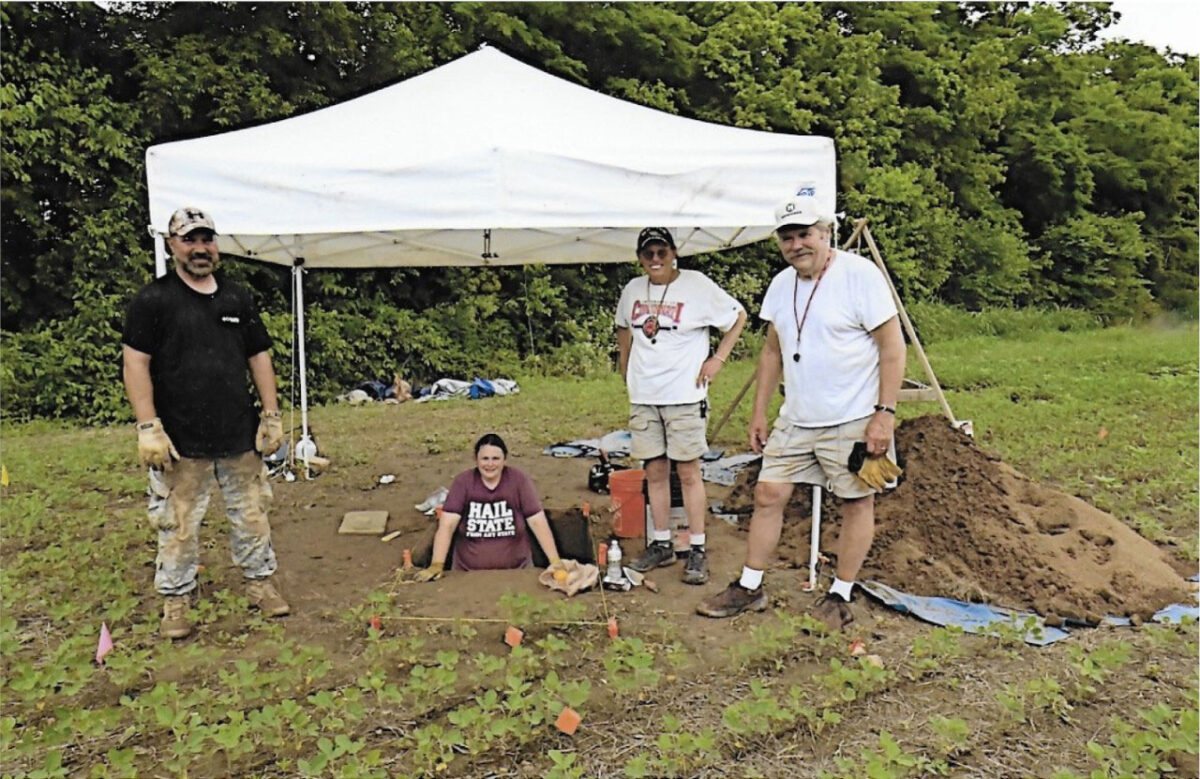 University of Cincinnati researchers take sediment samples at a Hopewell site at the confluence of the Ohio and Great Miami rivers. From left they are anthropology student Louis Herzner, biology student Stephanie Meyers, anthropology professor Kenneth Tankersley and UC geology alumnus Stephen Meyers. Photo/Larry Sandman