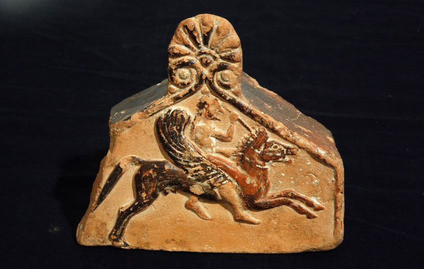 One of a pair of antefixes Clay Representations of Chimaera and Bellerophon mounting his winged horse, Pegasus. From Thasos. 550-500 BC. 
Credit National Archaeological Museum and Hellenic Ministry of Culture and Sports. 
Photographer Magoulas
