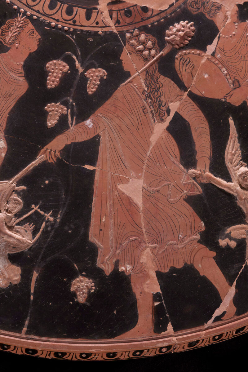 Detail of red figured shallow angular bowl with Dionysian scene. 4th c. BC. Acropolis Museum. Image: Sokratis Mavrommatis.