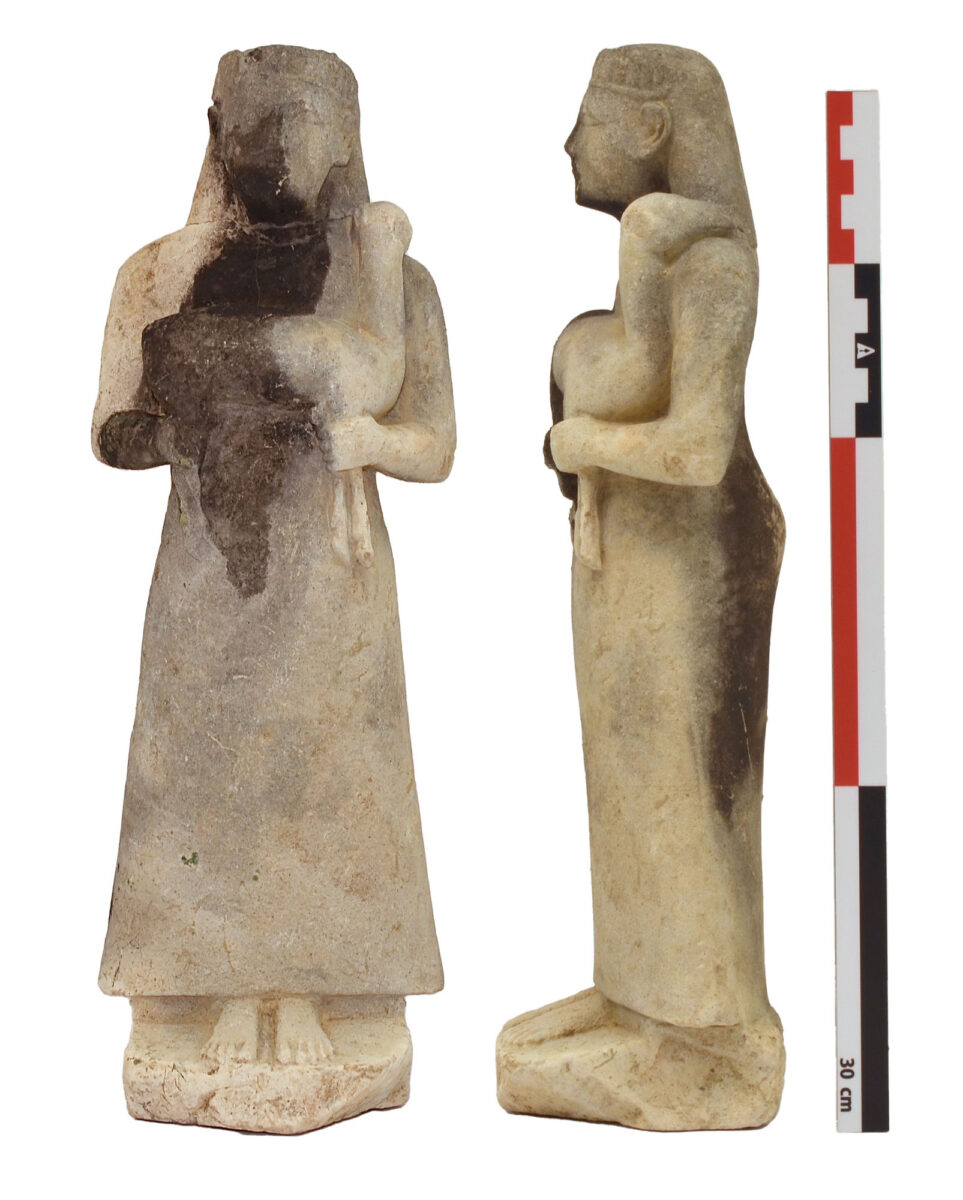 31 cm high stone statuette  depicting a female figure with a diadem and long garment hoding an animal (deer?) in her arms (beginning of 6th c. BC). Image credit: MOCAS.