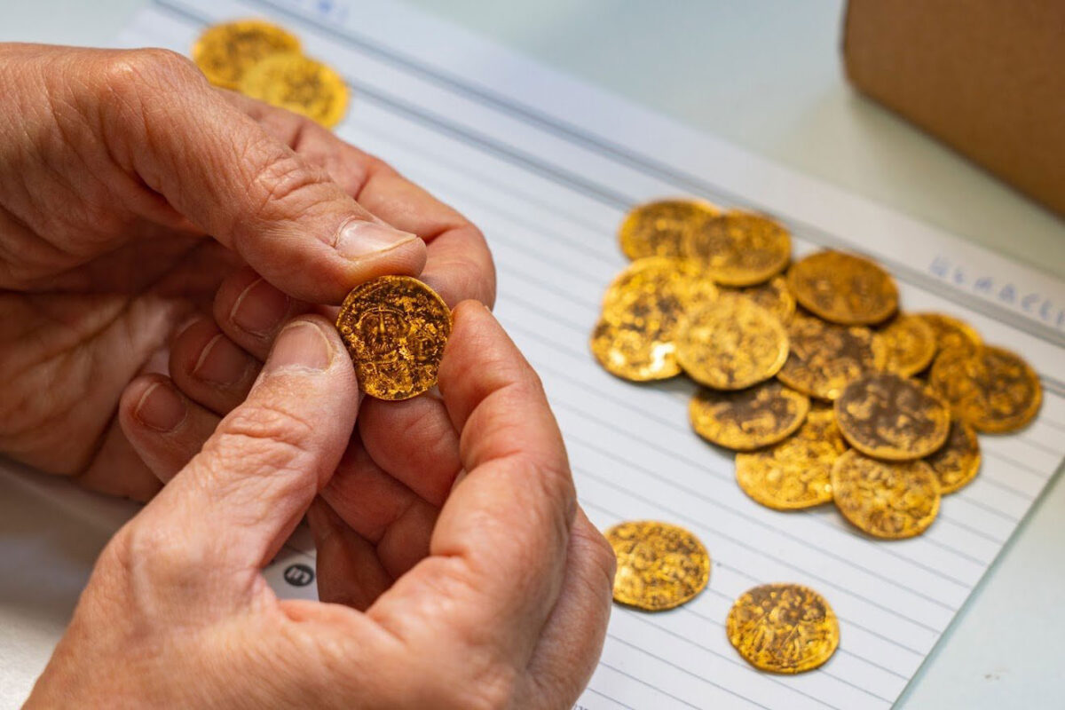 The coin hoard, composed entirely of gold solidus coins, and identified some coins of Emperor Phocas (602–610 CE), and many coins minted by Emperor Heraclius (610–641 CE). The latest coins of Heraclius date the coin hoard to the time of the Muslim Conquest of Byzantine Palestine in 635 CE. Image credit : IAA.
