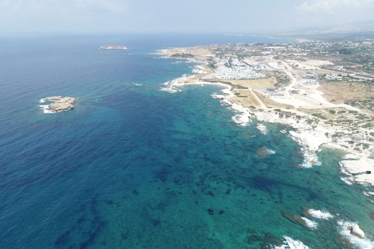 The harbor, island, and rugged mainland coast of Cape Drepanum form a rare, naturally beautiful, and culturally significant ‘maritime small world.’ Image credit: Department of Antiquities, Cyprus.