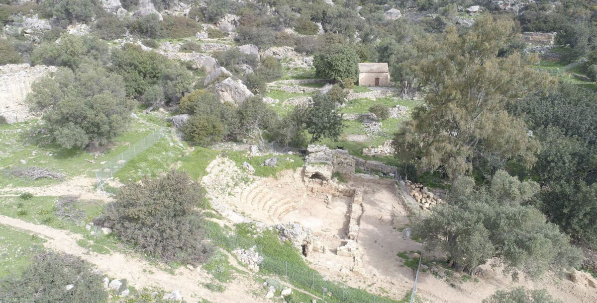 View of the ancient Odeon from the south of the Lissos archaeological site (the Byzantine church of Agios Kyrkos is in the background). Image: MOCAS