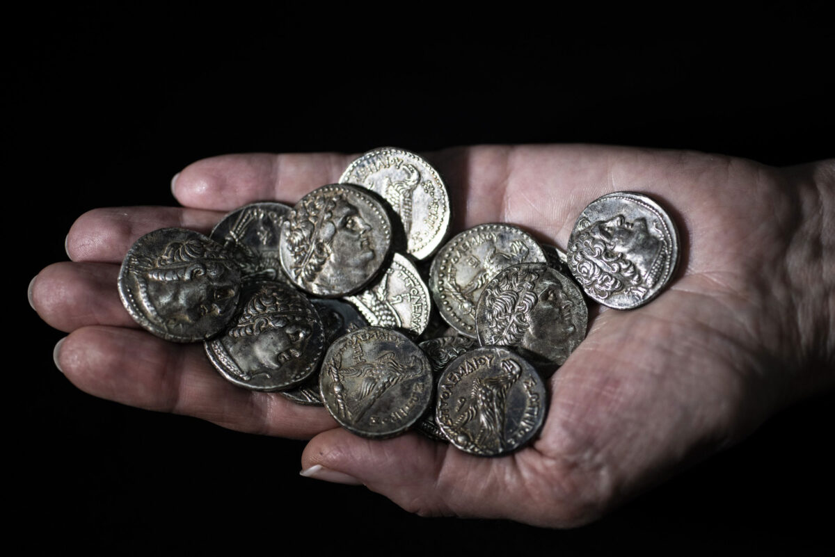 The small hoard of 15 silver coins. Image credit: The Friends of the Israel Antiquities Authority.