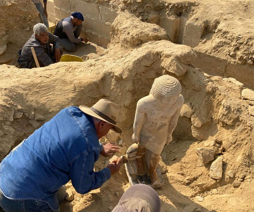 Zahi Hawass with a complete statue. Gisr el Mudir, Saqqara, Jan. 2023. Credit. Zahi Hawass.