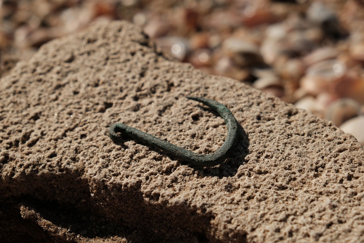 A 6,000-year-old copper fishing hook found in Ashkelon