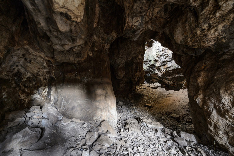 An entrance to the Dinaledi Chamber of the Rising Star Cave system, part of the Cradle of Humankind World Heritage Site near Johannesburg, South Africa. Newly found grave sites and wall engravings have led a team of archaeologists to reevaluate the meaning-making capacity of an early human ancestor, Homo naledi. PHOTO: Jeff Miller