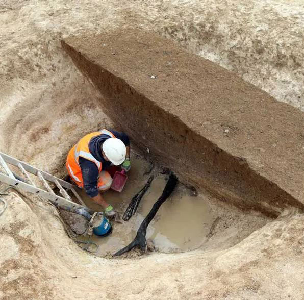 Saxon waterhole under excavation by Chris Ellis.