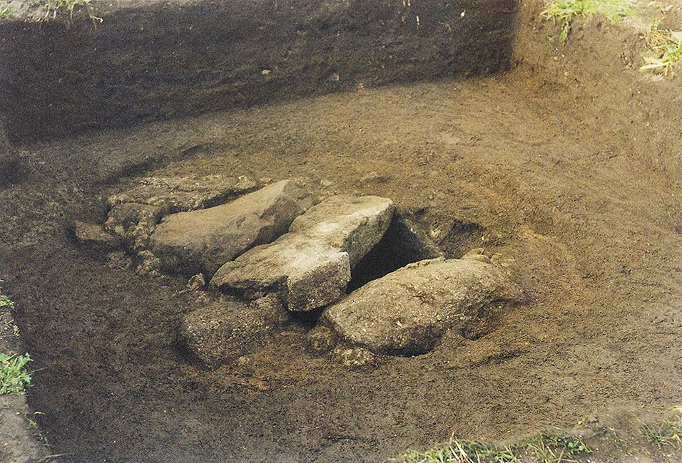 The Bryher burial, with capstones in place. © Isles of Scilly Museum Association.