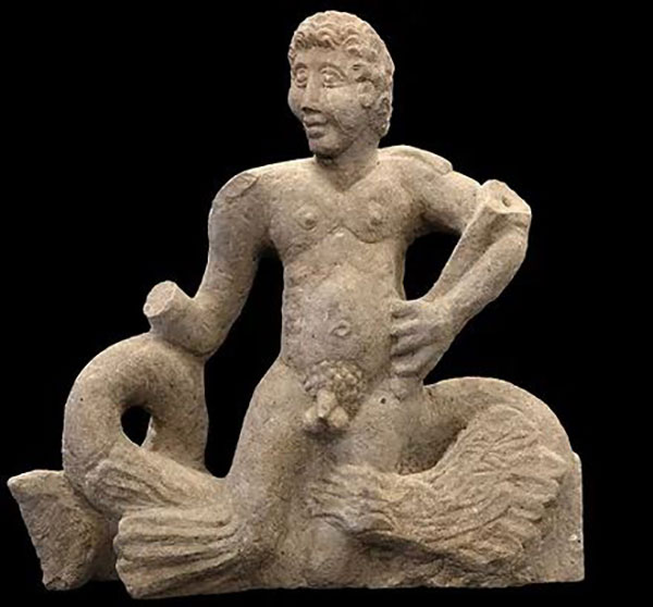 A unique stone statue of sea god Triton, son of Poseidon/Roman Neptune (or a Triton, one of the minions of Neptune).