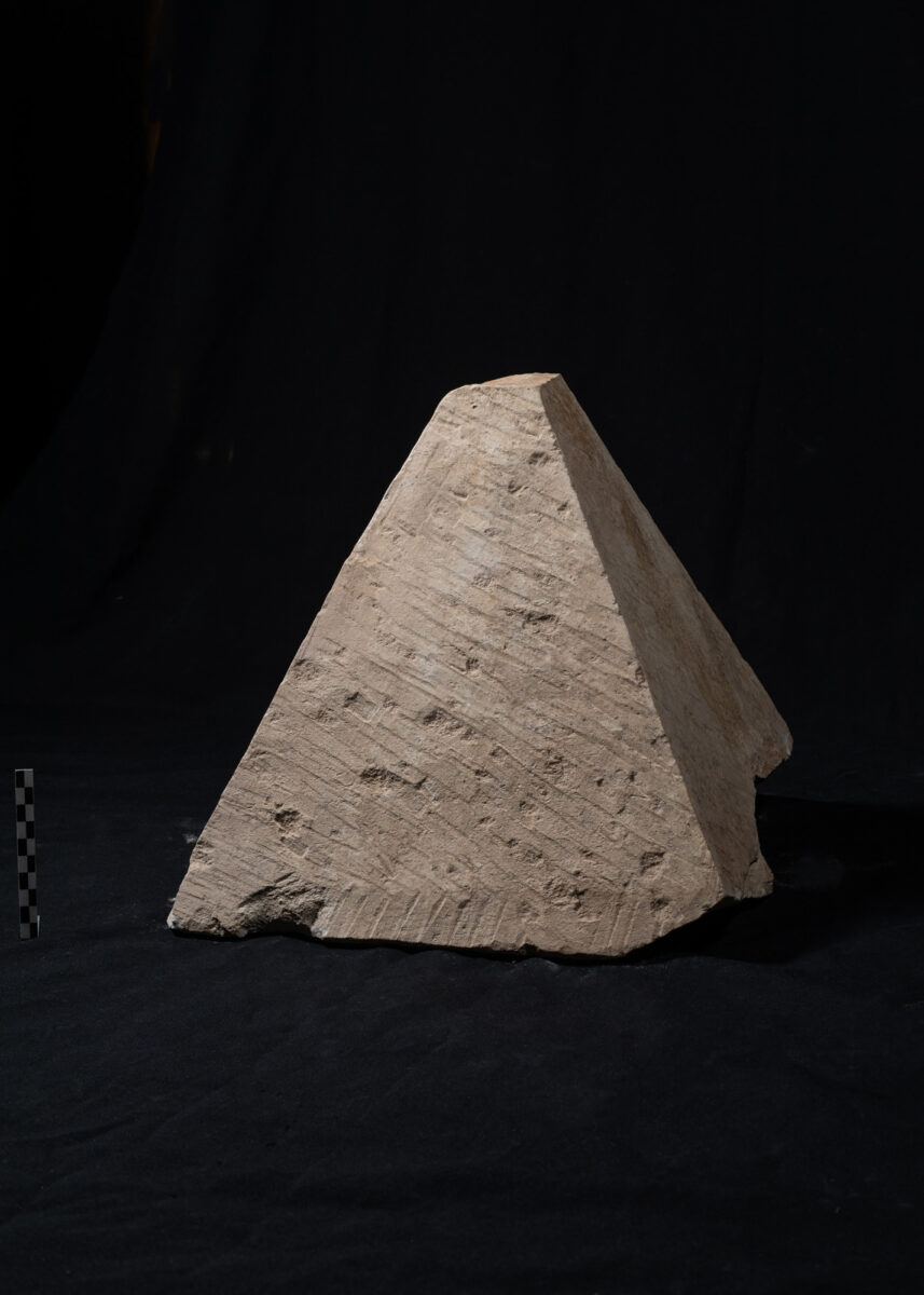 Pyramidion or obelisk tip found in the access shaft of Djhehutiemhat's tomb, but probably coming originally from the tomb of General Menekhibnekau or another high dignitary buried in Abusir. Credit: Petr Košárek, © Czech Institute of Egyptology.