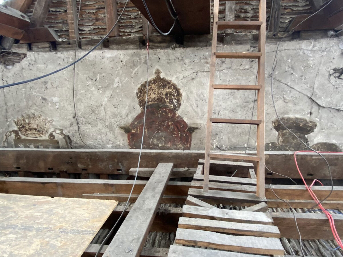 The wall paintings in the loft space. Photo: Tobit Curteis Associates LLP
