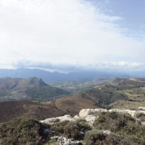 View to the west, from the acropolis. In the foreground Papoures and in the background the area of Agios Vasileios.