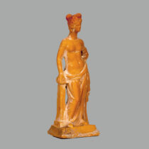 Terracotta female figurine from the Lower Town. 3rd c. BC. Archaeological Museum of Nafplion.