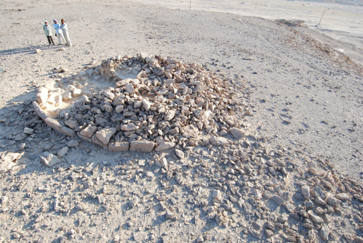 Researchers look over the remains of a platform monument, the largest type of monument studied. They were generally created in a single session, by multiple individuals. Photo: Joy McCorriston, The Ohio State University