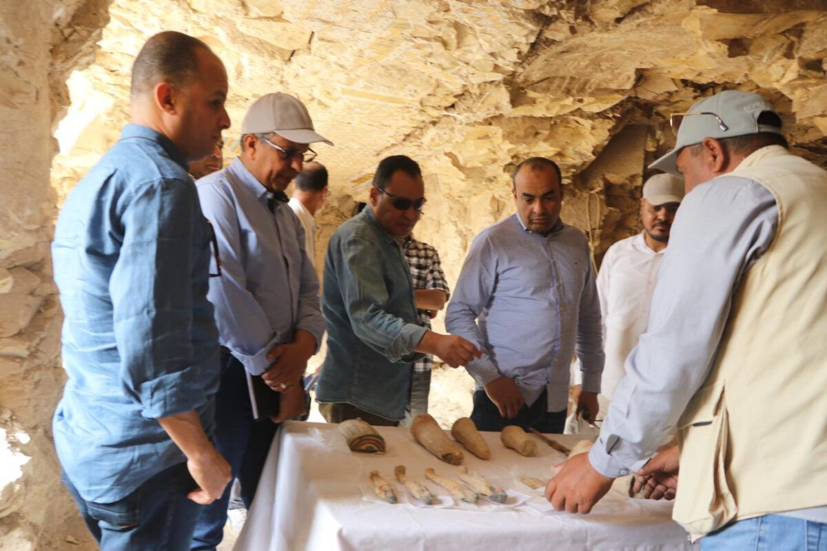 Archaeological authorities before finds from the tombs at Dra Abu El Naga. Source: MoTA Egypt.