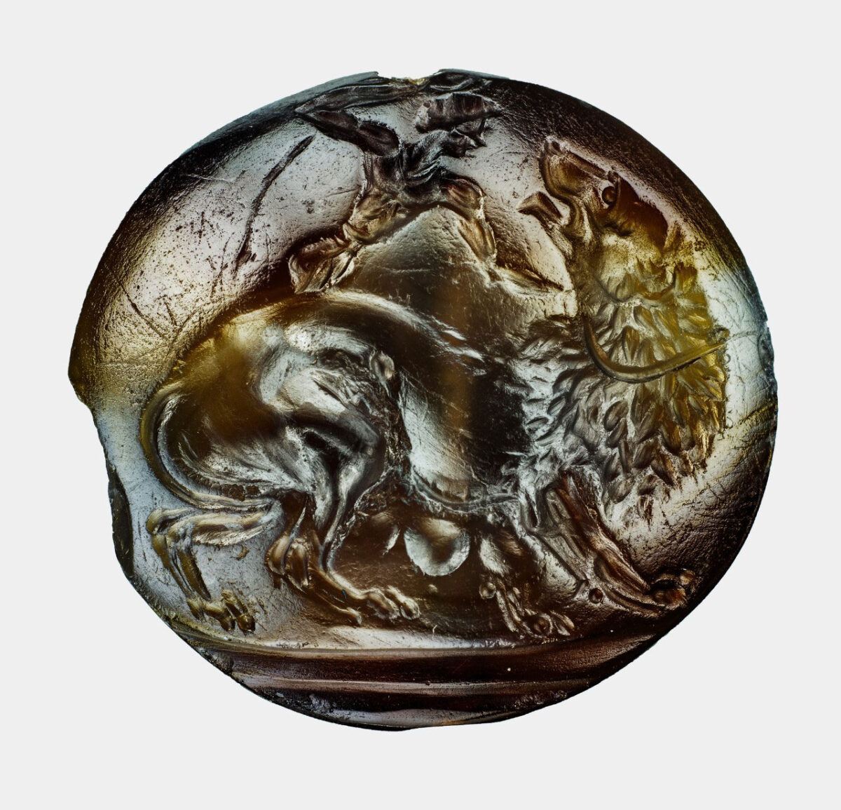 Among the artifacts that UC Classics researchers Jack Davis and Sharon Stocker found at Pylos, Greece, was this banded agate engraving of a warrior fighting a lion. The piece dates to 1630-1440 B.C.E. Photo/Jeff Vanderpool/UC Classics